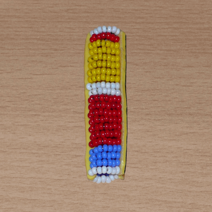 Bijou de locs africain Massai en perles de rocaille jaunes, rouges, bleues et blanches.