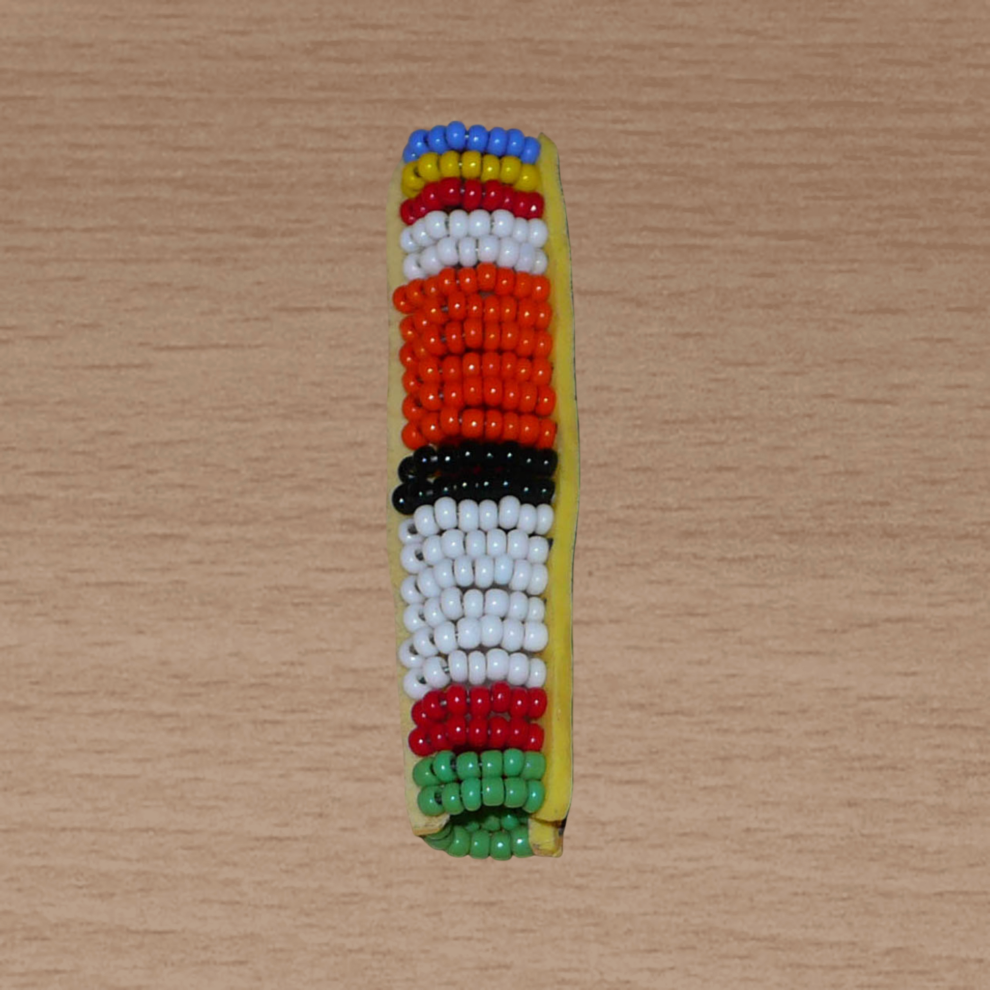 Bijou de locs africain Massai en perles de rocaille multicolores.