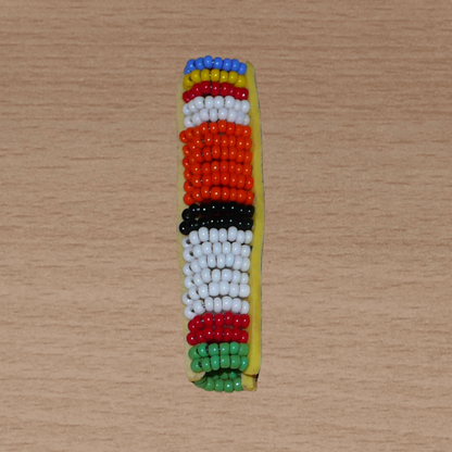 Bijou de locs africain Massai en perles de rocaille multicolores.