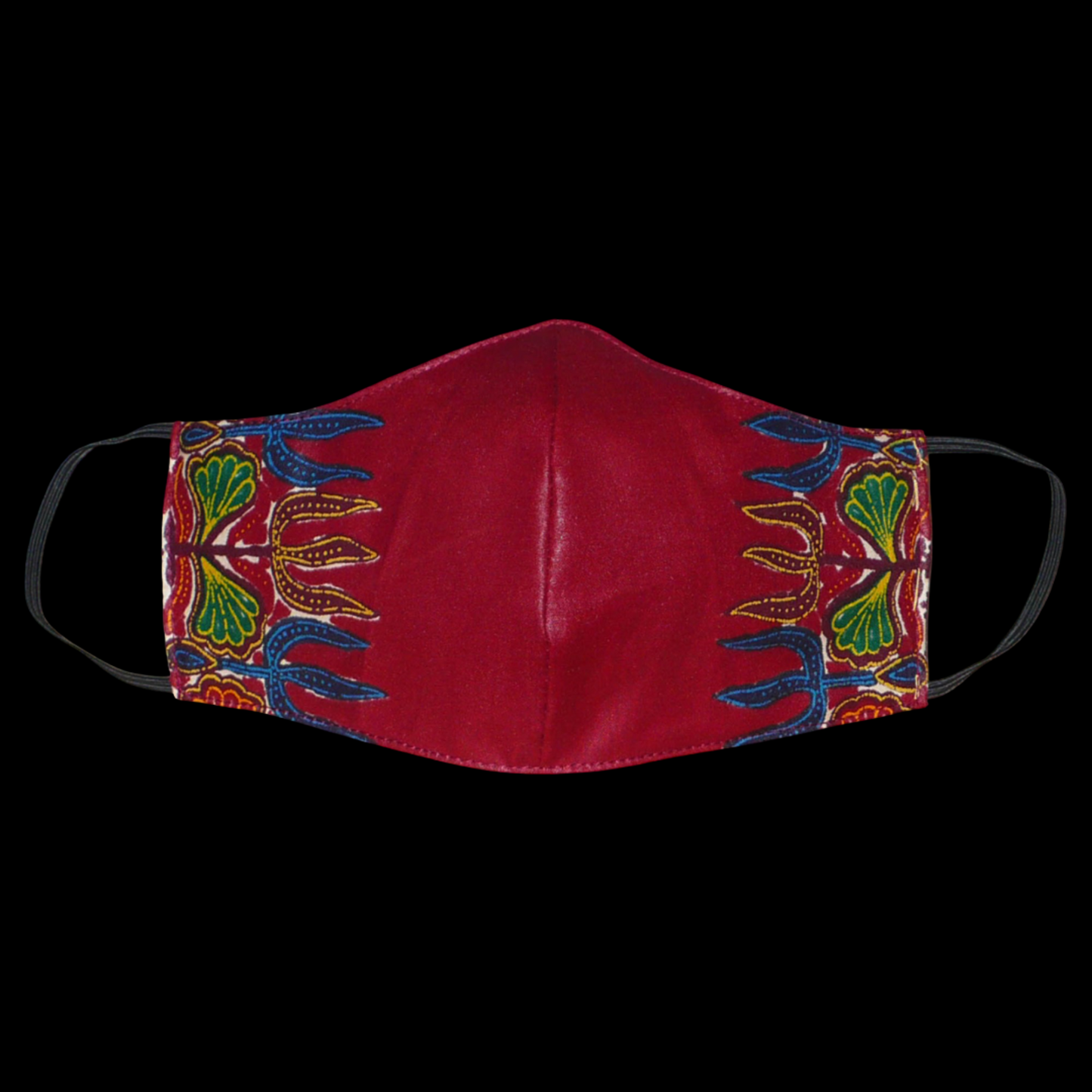 Masque facial en tissu africain bordeaux imprimé de motifs floraux multicolores, à porter avec des élastiques. Conçu dans une optique eco-responsable, il est lavable et réutilisable.