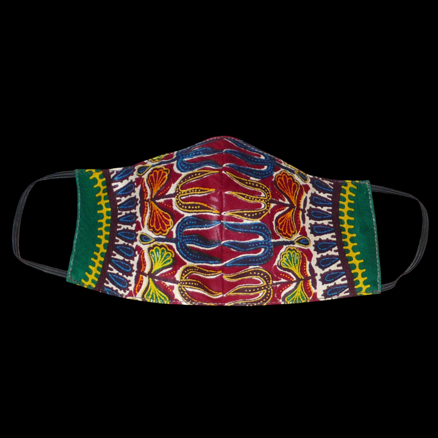 Masque textile ajusté en tissu africain imprimé de motifs ethniques floraux multicolores ; il se porte avec des élastiques. Fabriqué en vue d'une utilisation eco-friendly, ce masque est lavable et réutilisable. Il mesure 21 cm de long, et 40 cm en comptant les élastiques, il a une hauteur de 12 cm (du haut du nez jusqu'au menton) et une largeur sur les côtés de 7 cm.