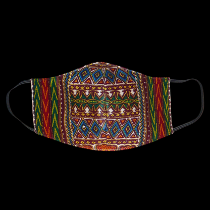 Masque textile pour homme, en tissu africain en coton imprimé de motifs tribaux multicolores, à porter avec des élastiques. Fabriqué dans une approche éco-responsable, il est lavable et réutilisable.