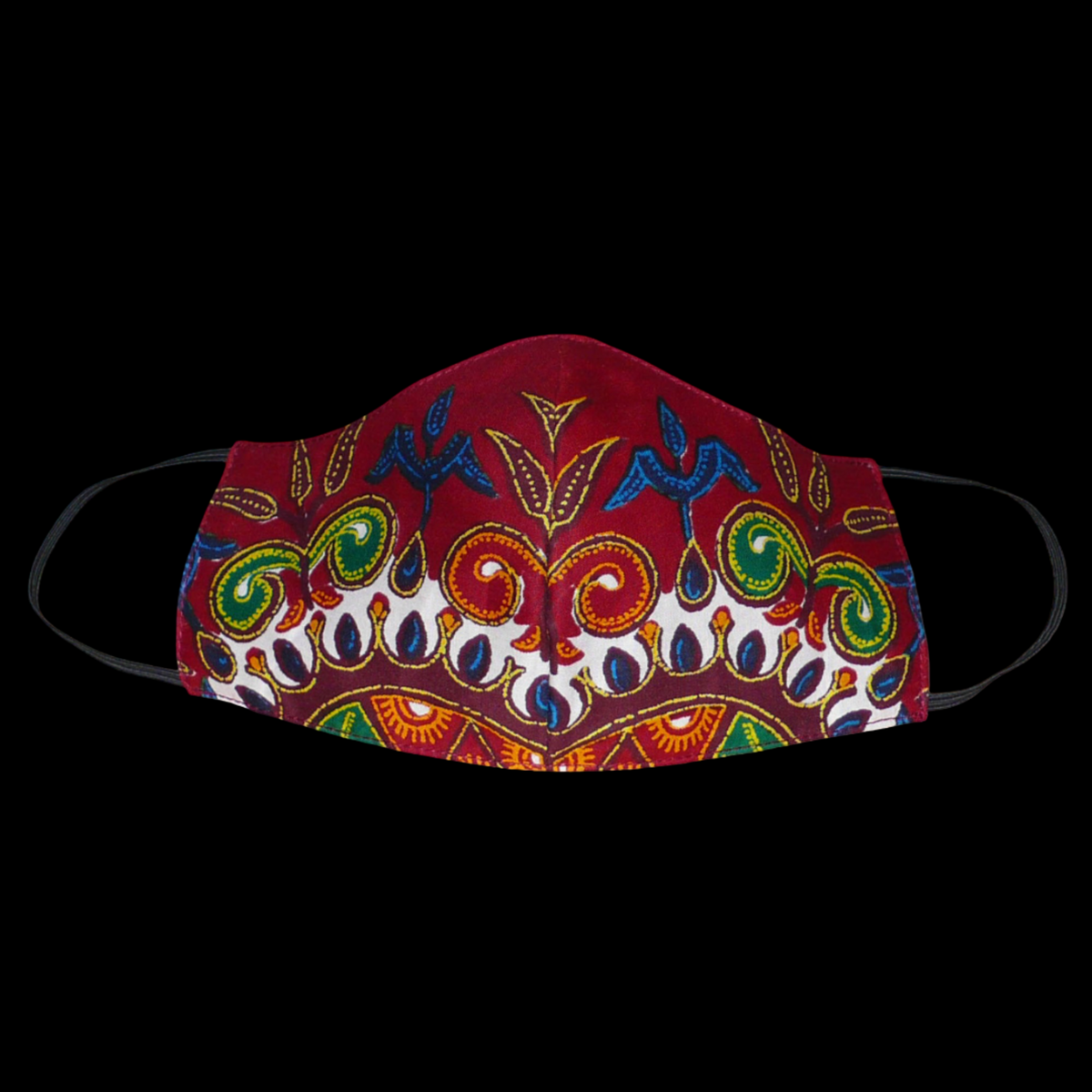 Masque facial textile à la coupe ajustée, cousu dans un tissu en coton bordeaux imprimé de motifs exotiques floraux multicolores.
