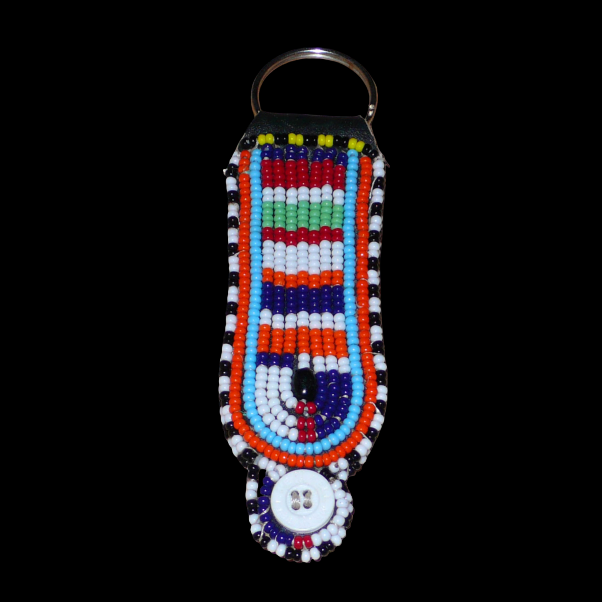 Porte-clés africain Massai composé de perles de rocaille multicolores et de boutons brodés sur un morceau de cuir. Ce porte-clés, brodé sur les deux faces, mesure 10,5 cm de long et 3 cm de large.
